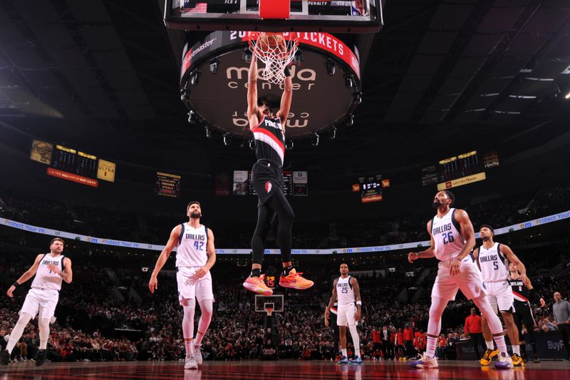 PORTLAND, OR - DECEMBER 1: Dalano Banton #5 of the Portland Trail Blazers dunks the ball during the game against the Dallas Mavericks on December 1, 2024 at the Moda Center Arena in Portland, Oregon. NOTE TO USER: User expressly acknowledges and agrees that, by downloading and or using this photograph, user is consenting to the terms and conditions of the Getty Images License Agreement. Mandatory Copyright Notice: Copyright 2024 NBAE (Photo by Cameron Browne/NBAE via Getty Images)