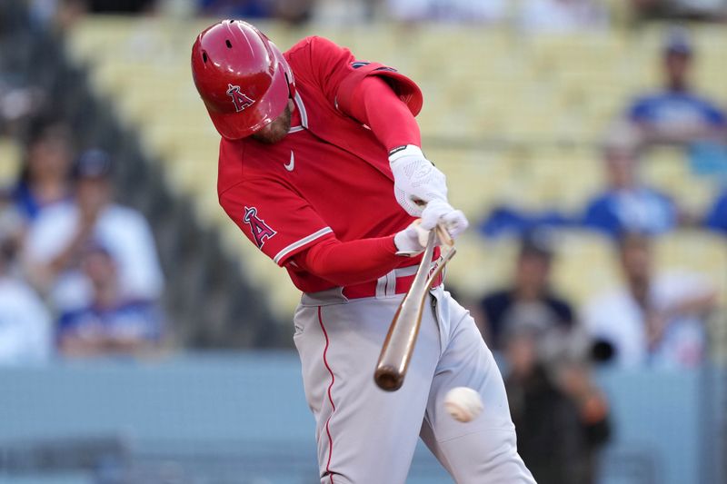 Apr 5, 2022; Los Angeles, California, USA; Los Angeles Angels right fielder Taylor Ward (3) breaks his bat in the first inning against the Los Angeles Dodgers at Dodger Stadium. Mandatory Credit: Kirby Lee-USA TODAY Sports