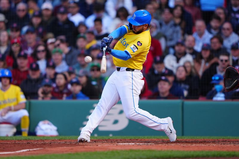 May 11, 2024; Boston, Massachusetts, USA; Boston Red Sox right fielder Wilyer Abreu (52) hits a home run against the Washington Nationals during the third inning at Fenway Park. Mandatory Credit: Gregory Fisher-USA TODAY Sports