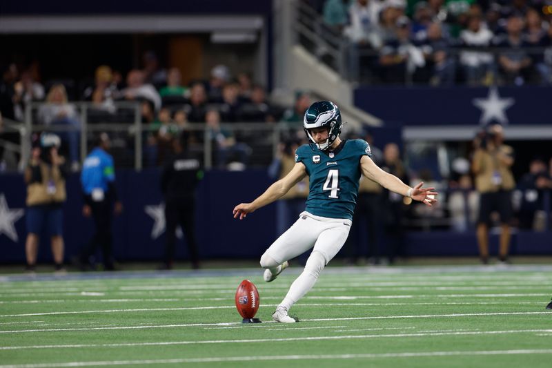 Philadelphia Eagles kicker Jake Elliott (4) kicks off after a field goal during an NFL football game against the Dallas Cowboys, Sunday, Dec. 10, 2023, in Arlington, Texas. (AP Photo/Matt Patterson)