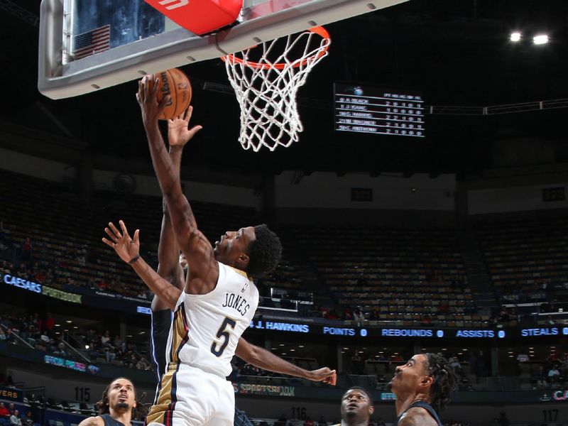 NEW ORLEANS, LA - OCTOBER 10: Herb Jones #5 of the New Orleans Pelicans drives to the basket during the game against the Orlando Magic on October 10, 2023 at the Smoothie King Center in New Orleans, Louisiana. NOTE TO USER: User expressly acknowledges and agrees that, by downloading and or using this Photograph, user is consenting to the terms and conditions of the Getty Images License Agreement. Mandatory Copyright Notice: Copyright 2023 NBAE (Photo by Layne Murdoch Jr./NBAE via Getty Images)