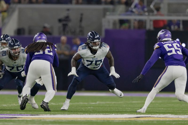 Tennessee Titans offensive tackle Jaelyn Duncan (79) in action during the second half of an NFL preseason football game against the Minnesota Vikings, Saturday, Aug. 19, 2023 in Minneapolis. Tennessee won 24-16. (AP Photo/Stacy Bengs)