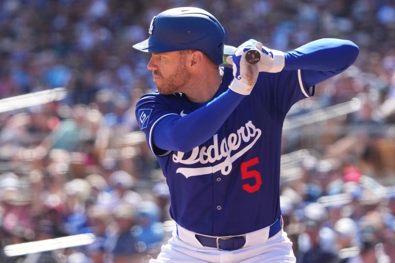 Mar 10, 2025; Phoenix, Arizona, USA; Los Angeles Dodgers first base Freddie Freeman (5) bats against the Los Angeles Dodgers during the second inning at Camelback Ranch-Glendale. Mandatory Credit: Joe Camporeale-Imagn Images