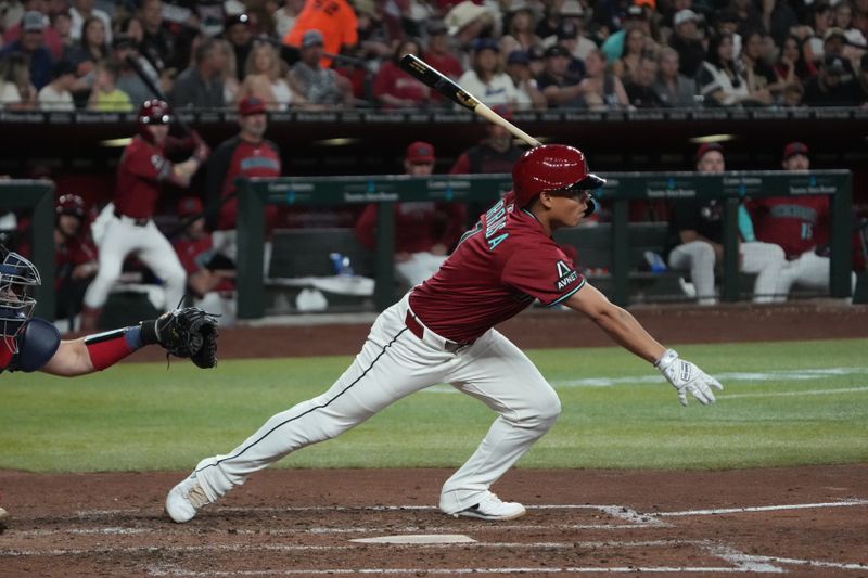 Apr 25, 2025; Phoenix, Arizona, USA; Arizona Diamondbacks outfielder Jorge Barrosa (1) hits an RBI single against the Atlanta Braves in the fourth inning at Chase Field. Mandatory Credit: Rick Scuteri-Imagn Images