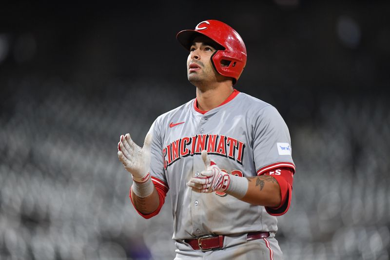 Apr 12, 2024; Chicago, Illinois, USA; Cincinnati Reds first base Christian Encarnacion-Strand (33) celebrates his two-run single while breaking his bat during the eighth inning against the Chicago White Sox at Guaranteed Rate Field. Mandatory Credit: Patrick Gorski-USA TODAY Sports