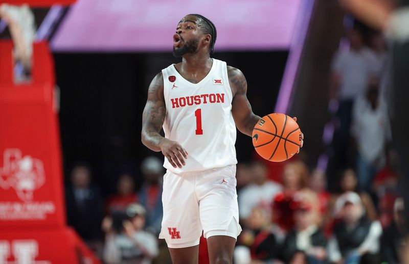 Dec 6, 2023; Houston, Texas, USA; Houston Cougars guard Jamal Shead (1) brings the ball up the court during the second half against the Rice Owls at Fertitta Center. Mandatory Credit: Troy Taormina-USA TODAY Sports