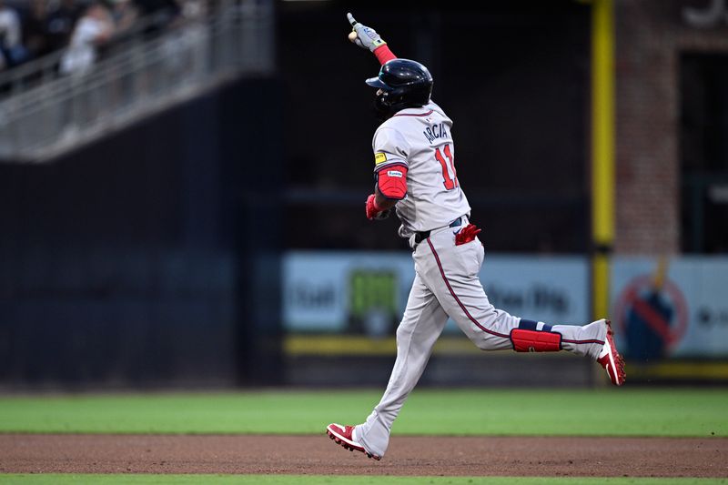 Jul 12, 2024; San Diego, California, USA; Atlanta Braves shortstop Orlando Arcia (11) rounds the bases after hitting a two-run home run against the San Diego Padres during the fifth inning at Petco Park. Mandatory Credit: Orlando Ramirez-USA TODAY Sports 