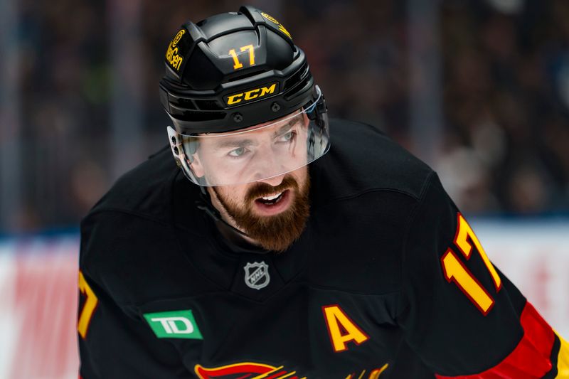 Mar 2, 2026; Vancouver, British Columbia, CAN; Vancouver Canucks defenseman Filip Hronek (17) during a stop in play against the Dallas Stars in the first period at Rogers Arena. Mandatory Credit: Bob Frid-Imagn Images