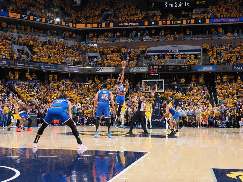 INDIANAPOLIS, IN - MAY 27: Mitchell Robinson #23 of the New York Knicks goes for the tipoff during the game against the Indiana Pacers  during Game Four of the Eastern Conference Finals on May 27, 2025 at Gainbridge Fieldhouse in Indianapolis, Indiana. NOTE TO USER: User expressly acknowledges and agrees that, by downloading and or using this Photograph, user is consenting to the terms and conditions of the Getty Images License Agreement. Mandatory Copyright Notice: Copyright 2025 NBAE (Photo by Ron Hoskins/NBAE via Getty Images)