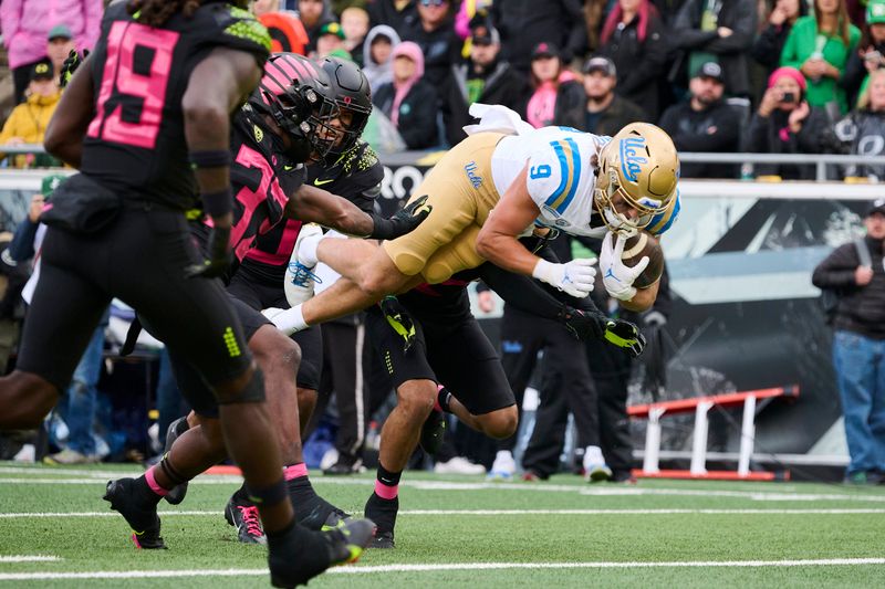 Oct 22, 2022; Eugene, Oregon, USA; UCLA Bruins wide receiver Jake Bobo (9) scores a touchdown during the second half against the Oregon Ducks at Autzen Stadium. The Ducks won the game 45-30. Mandatory Credit: Troy Wayrynen-USA TODAY Sports