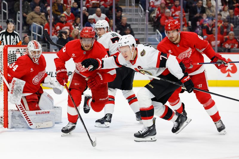 Jan 7, 2025; Detroit, Michigan, USA; Detroit Red Wings center Andrew Copp (18) and Ottawa Senators left wing Brady Tkachuk (7) fight for position in the first period at Little Caesars Arena. Mandatory Credit: Rick Osentoski-Imagn Images