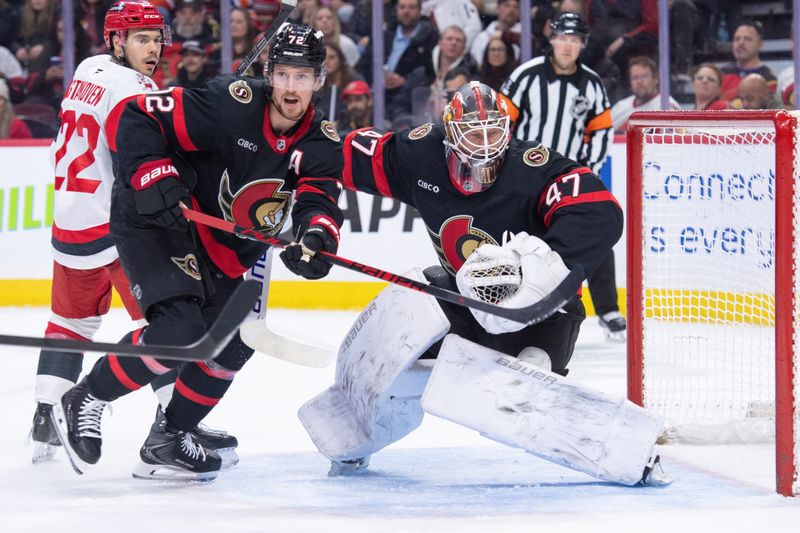 Jan 24, 2026; Ottawa, Ontario, CAN; Ottawa Senators defenseman Thomas Chabot (72) follows the puck following a save by goalie James Reimer (47) in the second period against the Carolina Hurricanes at the Canadian Tire Centre. Mandatory Credit: Marc DesRosiers-IMAGN Images