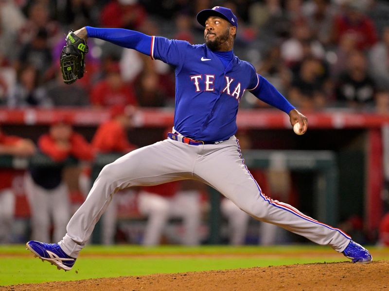 Sep 27, 2023; Anaheim, California, USA; Texas Rangers relief pitcher Aroldis Chapman (45) throws to the plate in the seventh inning against the Los Angeles Angels at Angel Stadium. Mandatory Credit: Jayne Kamin-Oncea-USA TODAY Sports