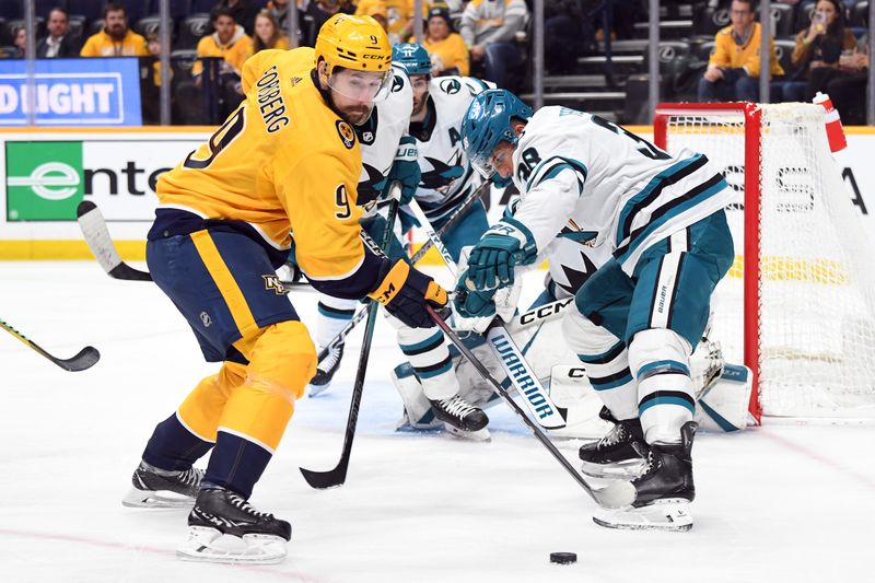 Mar 19, 2024; Nashville, Tennessee, USA; Nashville Predators left wing Filip Forsberg (9) plays the puck during the first period against the San Jose Sharks at Bridgestone Arena. Mandatory Credit: Christopher Hanewinckel-USA TODAY Sports