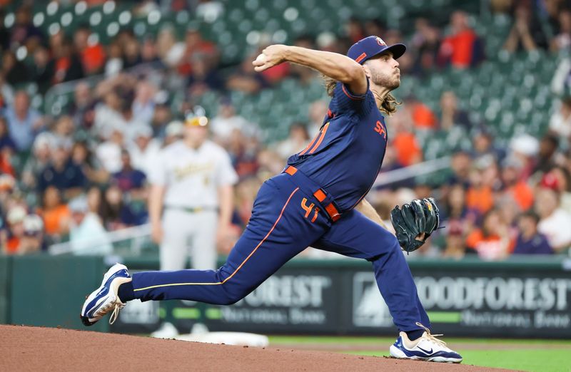 May 13, 2024; Houston, Texas, USA; Houston Astros starting pitcher Spencer Arrighetti (41) pitches against the Oakland Athletics in the first inning at Minute Maid Park. Mandatory Credit: Thomas Shea-USA TODAY Sports