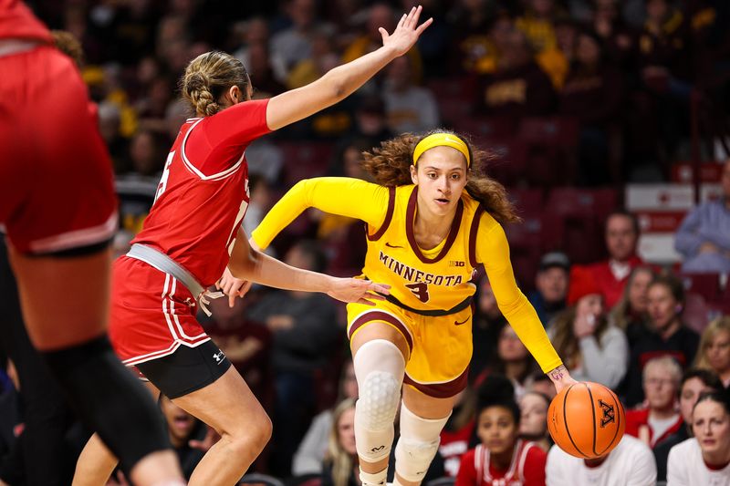 Feb 20, 2024; Minneapolis, Minnesota, USA; Minnesota Golden Gophers forward Ayianna Johnson (1) works around Wisconsin Badgers guard Sania Copeland (15) during the first half at Williams Arena. Mandatory Credit: Matt Krohn-USA TODAY Sports