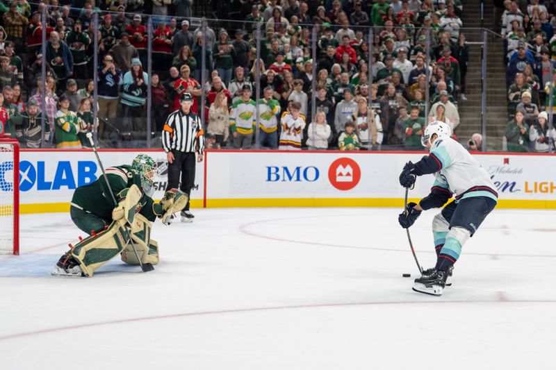 Oct 12, 2024; Saint Paul, Minnesota, USA; Seattle Kraken right wing Jordan Eberle (7) scores against Minnesota Wild goaltender Marc-Andre Fleury (29) for the winning goal in the shootout at Xcel Energy Center. Mandatory Credit: Matt Blewett-Imagn Images