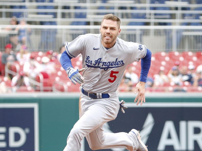 Sep 10, 2023; Washington, District of Columbia, USA; Los Angeles Dodgers first baseman Freddie Freeman (5) runs to third base in the first inning against the Washington Nationals at Nationals Park. Mandatory Credit: Amber Searls-USA TODAY Sports