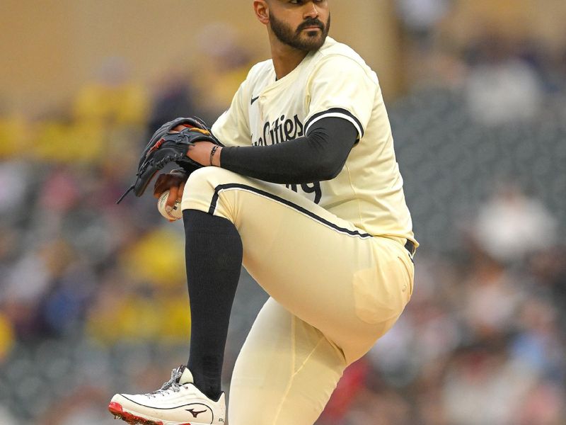 May 26, 2024; Minneapolis, Minnesota, USA;  Minnesota Twins pitcher Pablo Lopez (49) delivers a pitch against the Texas Rangers during the first inning at Target Field. Mandatory Credit: Nick Wosika-USA TODAY Sports
