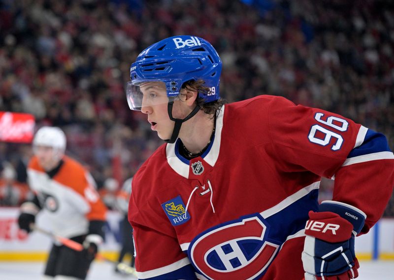 Sep 23, 2025; Montreal, Quebec, CAN; Montreal Canadiens forward Vinzenz Rohrer (96) plays the puck during the second period against the Philadelphia Flyers at the Bell Centre. Mandatory Credit: Eric Bolte-Imagn Images