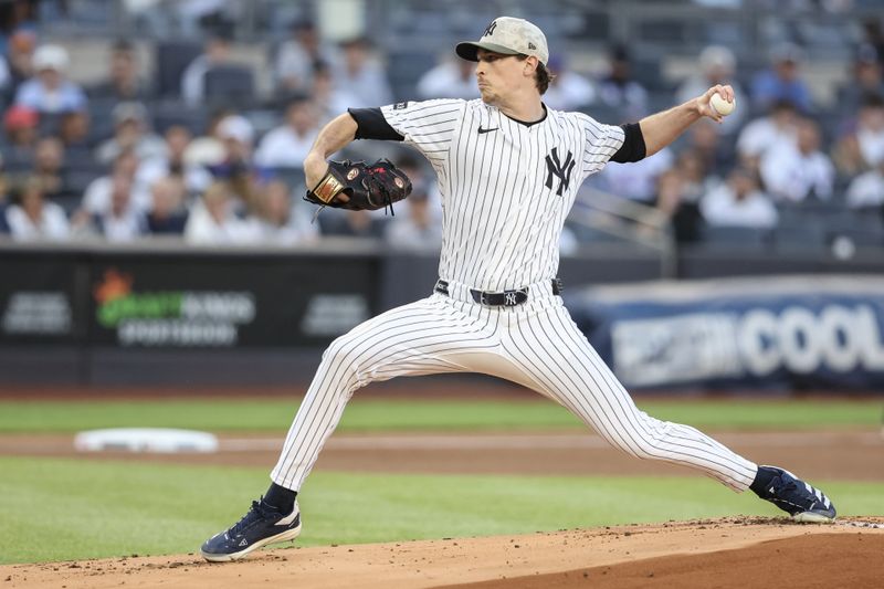 May 18, 2025; Bronx, New York, USA;  New York Yankees starting pitcher Max Fried (54) pitches in the first inning against the New York Mets at Yankee Stadium. Mandatory Credit: Wendell Cruz-Imagn Images