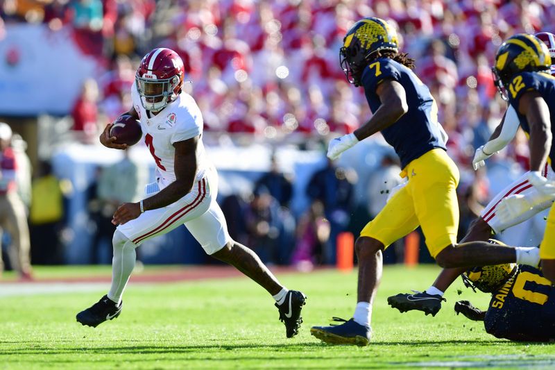 Jan 1, 2024; Pasadena, CA, USA; Alabama Crimson Tide quarterback Jalen Milroe (4) runs against the Michigan Wolverines in the first quarter in the 2024 Rose Bowl college football playoff semifinal game at Rose Bowl. Mandatory Credit: Gary A. Vasquez-USA TODAY Sports