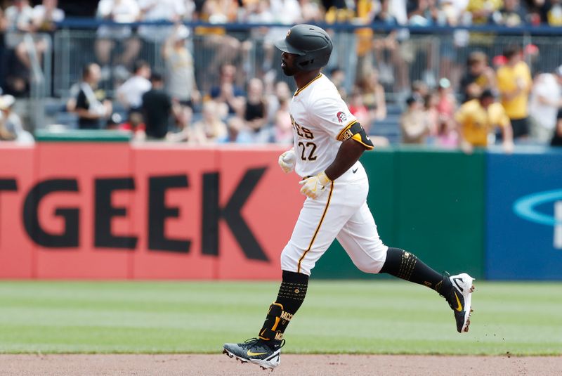 May 23, 2024; Pittsburgh, Pennsylvania, USA; Pittsburgh Pirates designated hitter Andrew McCutchen (22) circles the bases after hitting a solo home run against the San Francisco Giants during the first inning at PNC Park. Mandatory Credit: Charles LeClaire-USA TODAY Sports