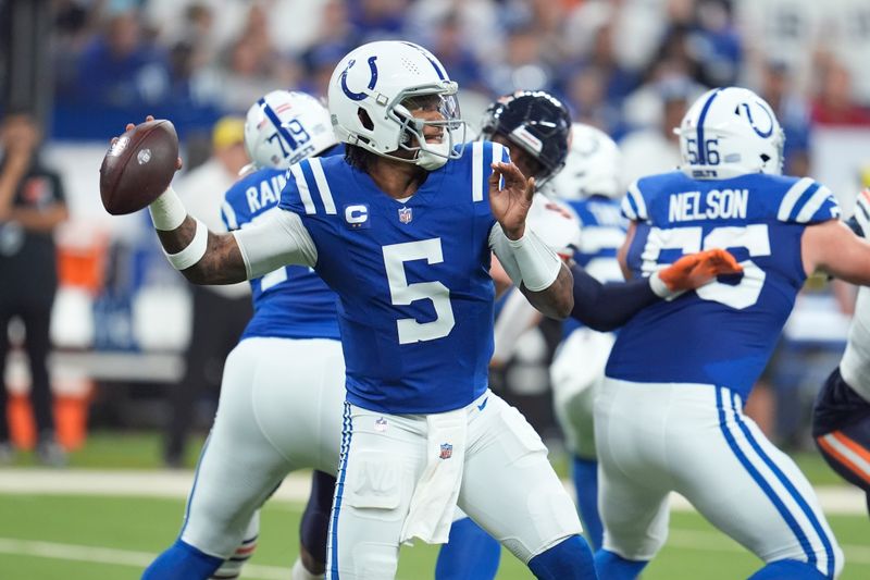 Indianapolis Colts quarterback Anthony Richardson (5) throws against the Chicago Bears during the first half of an NFL football game Sunday, Sept. 22, 2024, in Indianapolis. (AP Photo/Michael Conroy)