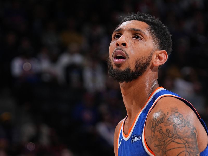 DENVER, CO - NOVEMBER 25: Cameron Payne #1 of the New York Knicks shoots a free throw during the game against the Denver Nuggets on November 25, 2024 at Ball Arena in Denver, Colorado. NOTE TO USER: User expressly acknowledges and agrees that, by downloading and/or using this Photograph, user is consenting to the terms and conditions of the Getty Images License Agreement. Mandatory Copyright Notice: Copyright 2024 NBAE (Photo by Garrett Ellwood/NBAE via Getty Images)