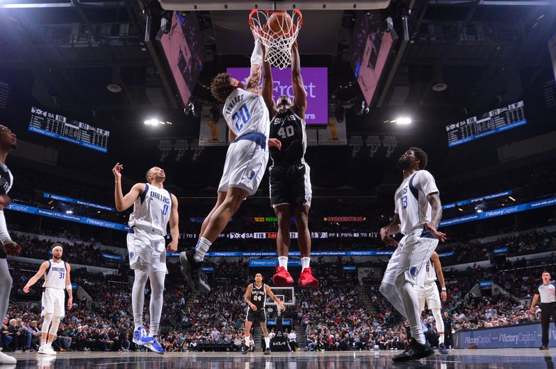 SAN ANTONIO, TX - MARCH 10:  Harrison Barnes #40 of the San Antonio Spurs dunks the ball during the game against the Dallas Mavericks on March 10, 2025 at the Frost Bank Center in San Antonio, Texas. NOTE TO USER: User expressly acknowledges and agrees that, by downloading and or using this photograph, user is consenting to the terms and conditions of the Getty Images License Agreement. Mandatory Copyright Notice: Copyright 2025 NBAE (Photos by Michael Gonzales/NBAE via Getty Images)