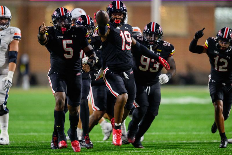 Sep 15, 2023; College Park, Maryland, USA; Maryland Terrapins defensive lineman Donnell Brown reacts after an interception during the fourth quarter against the Virginia Cavaliers at SECU Stadium. Mandatory Credit: Reggie Hildred-USA TODAY Sports