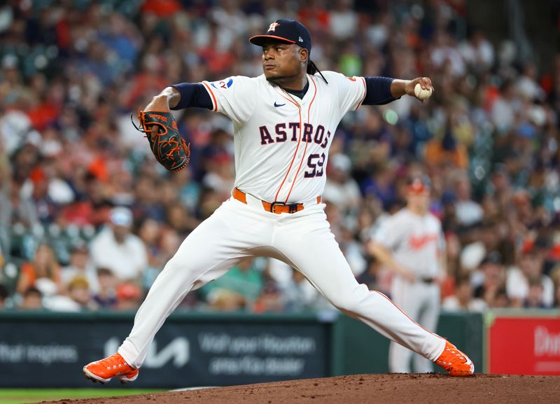 Jun 23, 2024; Houston, Texas, USA;  Houston Astros starting pitcher Framber Valdez (59) pitches against the Baltimore Orioles in the first inning at Minute Maid Park. Mandatory Credit: Thomas Shea-USA TODAY Sports