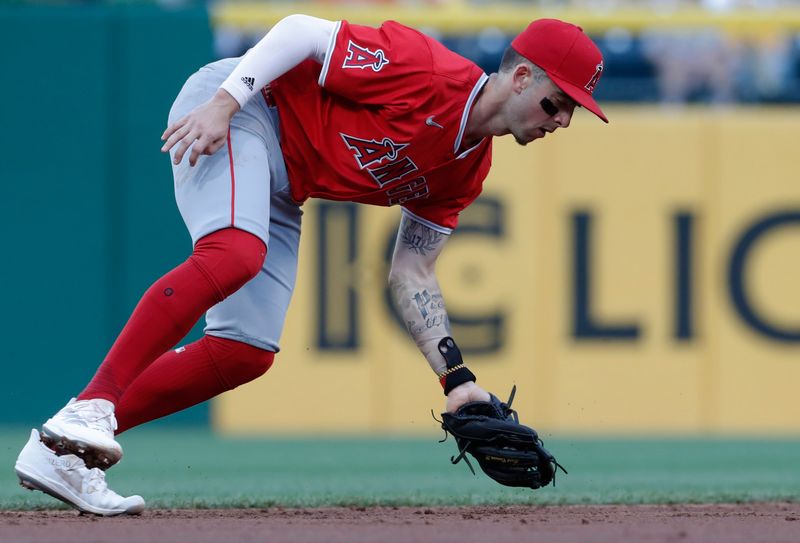 May 7, 2024; Pittsburgh, Pennsylvania, USA;  Los Angeles Angels shortstop Zach Neto (9) catches a low line drive for an out against Pittsburgh Pirates shortstop Alika Williams (not pictured) during the third inning at PNC Park. Mandatory Credit: Charles LeClaire-USA TODAY Sports