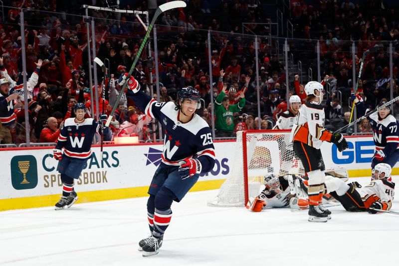 Jan 16, 2024; Washington, District of Columbia, USA; Washington Capitals defenseman Ethan Bear (25) celebrates after scoring a goal on Anaheim Ducks goaltender John Gibson (36) in the first period at Capital One Arena. Mandatory Credit: Geoff Burke-USA TODAY Sports