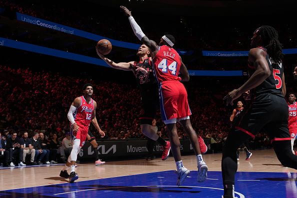 PHILADELPHIA, PA - DECEMBER 22: Malachi Flynn #22 of the Toronto Raptors drives to the basket during the game against the Philadelphia 76ers on December 22, 2023 at the Wells Fargo Center in Philadelphia, Pennsylvania NOTE TO USER: User expressly acknowledges and agrees that, by downloading and/or using this Photograph, user is consenting to the terms and conditions of the Getty Images License Agreement. Mandatory Copyright Notice: Copyright 2023 NBAE (Photo by Jesse D. Garrabrant/NBAE via Getty Images)