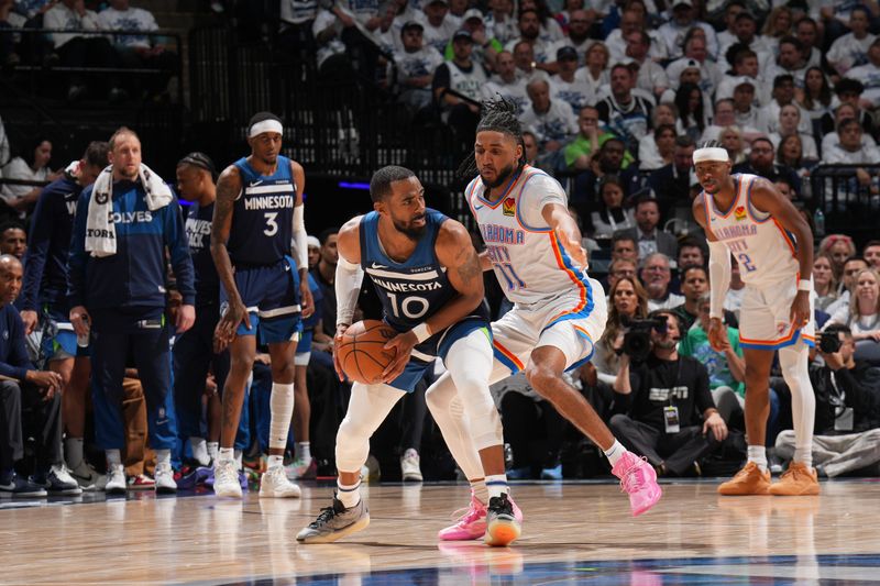 MINNEAPOLIS, MN -  MAY 24:  Mike Conley #10 of the Minnesota Timberwolves looks to pass the ball during the game against the Oklahoma City Thunder during Game 3 of the 2025 NBA Western Conference Finals on May 24, 2025 at Target Center in Minneapolis, Minnesota. NOTE TO USER: User expressly acknowledges and agrees that, by downloading and or using this Photograph, user is consenting to the terms and conditions of the Getty Images License Agreement. Mandatory Copyright Notice: Copyright 2025 NBAE (Photo by Jesse D. Garrabrant/NBAE via Getty Images)