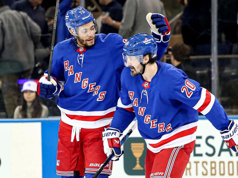 Jan 18, 2025; New York, New York, USA; New York Rangers defenseman K'Andre Miller (79) celebrates with  left wing Chris Kreider (20) after a 1-0 shootout win against the Columbus Blue Jackets at Madison Square Garden. Mandatory Credit: Danny Wild-Imagn Images