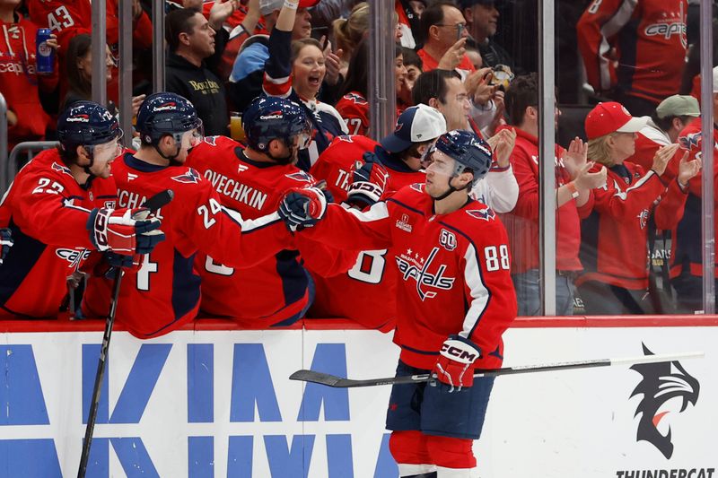 Nov 8, 2024; Washington, District of Columbia, USA; Washington Capitals left wing Andrew Mangiapane (88) celebrates with teammates after scoring a goal against the Pittsburgh Penguins in the second period at Capital One Arena. Mandatory Credit: Geoff Burke-Imagn Images