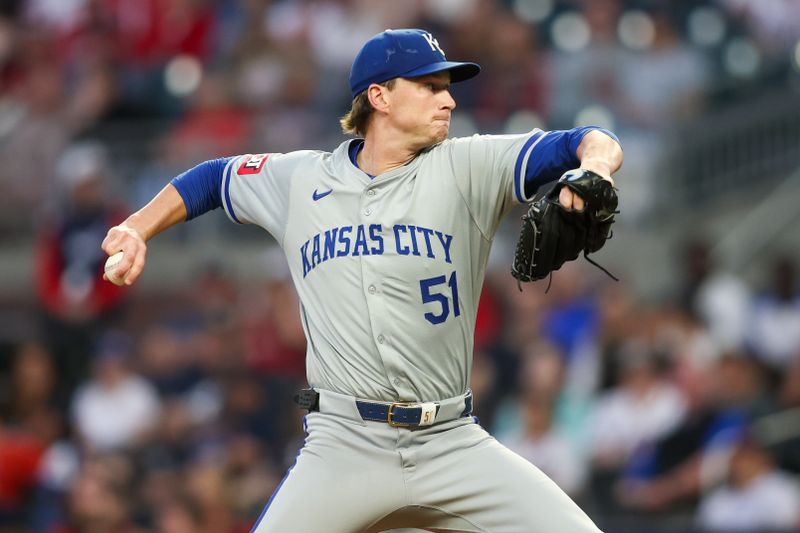 Sep 27, 2024; Atlanta, Georgia, USA; Kansas City Royals starting pitcher Brady Singer (51) throws against the Atlanta Braves in the first inning at Truist Park. Mandatory Credit: Brett Davis-Imagn Images