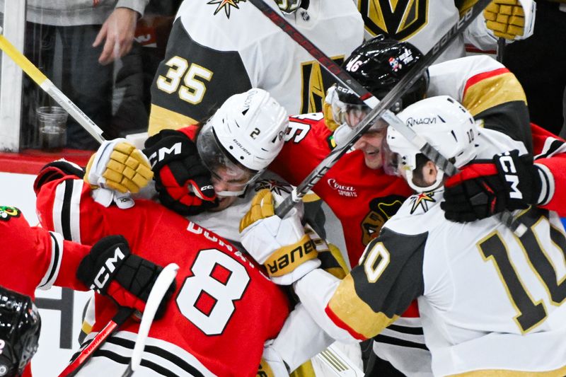 Jan 18, 2025; Chicago, Illinois, USA;  Vegas Golden Knights defenseman Zach Whitecloud (2) and Chicago Blackhawks defenseman Louis Crevier (46) fight with teammates  during the third period at United Center. Mandatory Credit: Matt Marton-Imagn Images