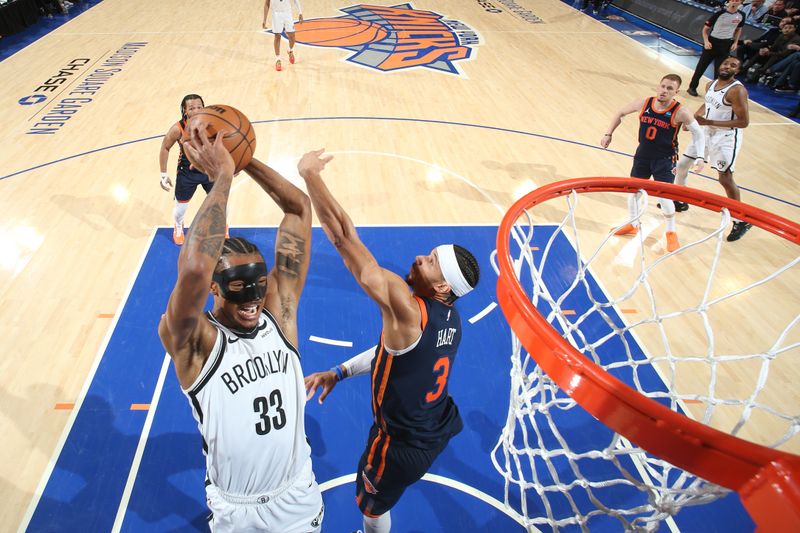 NEW YORK, NY - APRIL 12: Nicolas Claxton #33 of the Brooklyn Nets drives to the basket during the game against the New York Knicks on April 12, 2024 at Madison Square Garden in New York City, New York.  NOTE TO USER: User expressly acknowledges and agrees that, by downloading and or using this photograph, User is consenting to the terms and conditions of the Getty Images License Agreement. Mandatory Copyright Notice: Copyright 2024 NBAE  (Photo by Nathaniel S. Butler/NBAE via Getty Images)