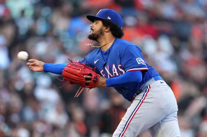 Aug 12, 2023; San Francisco, California, USA; Texas Rangers relief pitcher Grant Anderson (65) throws a pitch against the San Francisco Giants during the third inning at Oracle Park. Mandatory Credit: Darren Yamashita-USA TODAY Sports