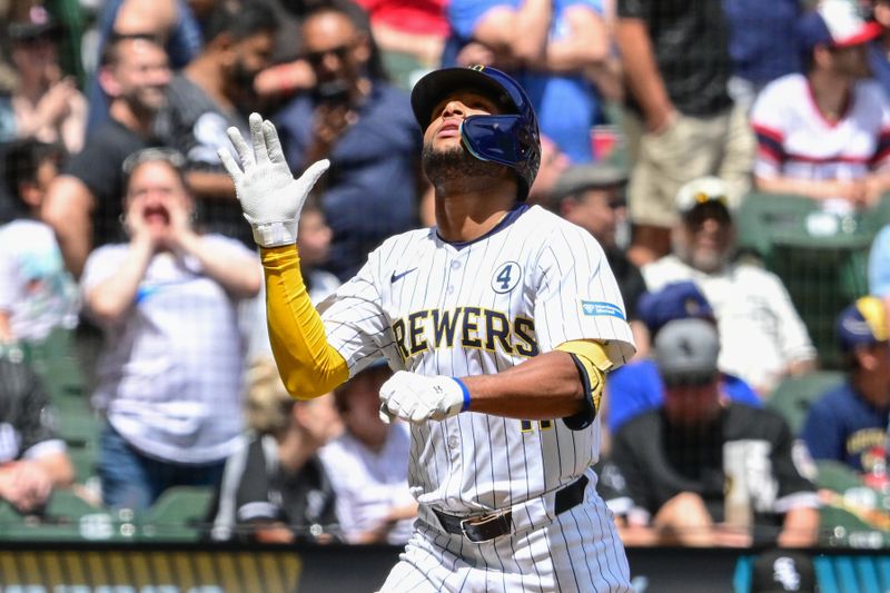 Jun 2, 2024; Milwaukee, Wisconsin, USA;  Milwaukee Brewers right fielder Jackson Chourio (11) reacts after hitting a three-run home run in the second inning against the Chicago White Soxat American Family Field. Mandatory Credit: Benny Sieu-USA TODAY Sports