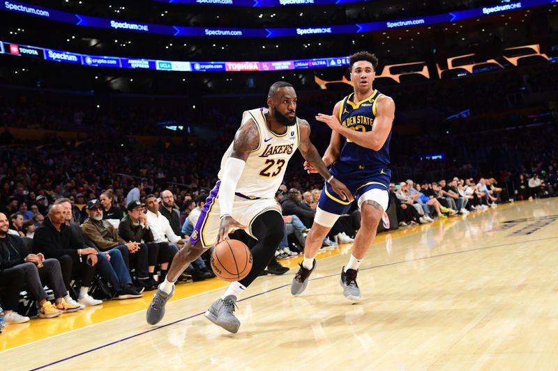 LOS ANGELES, CA - MACH 16: LeBron James #23 of the Los Angeles Lakers dribbles the ball during the game against the Golden State Warriors on March 16, 2024 at Crypto.Com Arena in Los Angeles, California. NOTE TO USER: User expressly acknowledges and agrees that, by downloading and/or using this Photograph, user is consenting to the terms and conditions of the Getty Images License Agreement. Mandatory Copyright Notice: Copyright 2024 NBAE (Photo by Adam Pantozzi/NBAE via Getty Images)