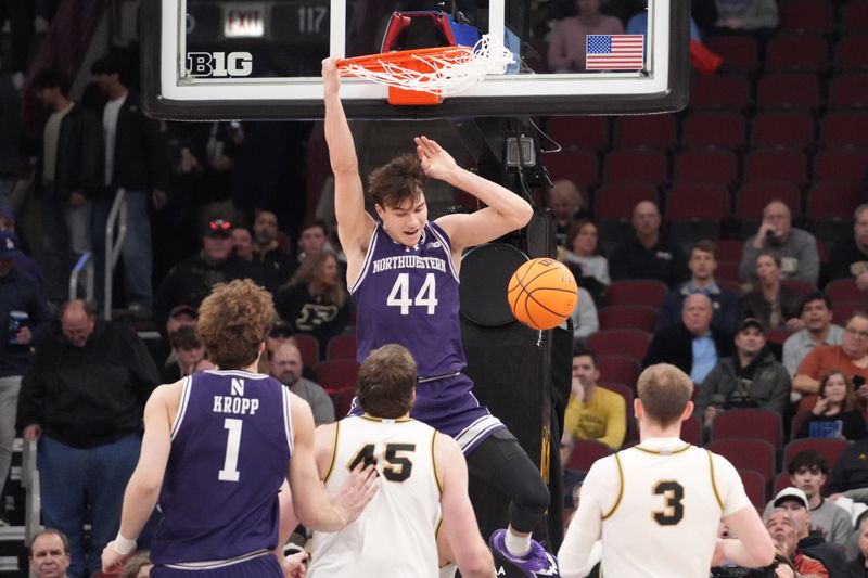 Mar 12, 2026; Chicago, IL, USA; Northwestern Wildcats guard Angelo Ciaravino (44) dunks the ball against the Purdue Boilermakers during the first half at United Center. Mandatory Credit: David Banks-Imagn Images