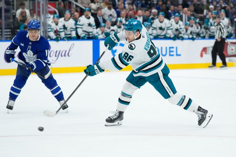 Dec 11, 2025; Toronto, Ontario, CAN; San Jose Sharks forward Philipp Kurashev (96) shoots the puck as Toronto Maple Leafs forward Max Domi (11) closes in during overtime at Scotiabank Arena. Mandatory Credit: John E. Sokolowski-Imagn Images Dec 11, 2025; Toronto, Ontario, CAN; San Jose Sharks forward Philipp Kurashev (96) shoots the puck as Toronto Maple Leafs forward Max Domi (11) closes in during overtime at Scotiabank Arena. Mandatory Credit: John E. Sokolowski-Imagn Images