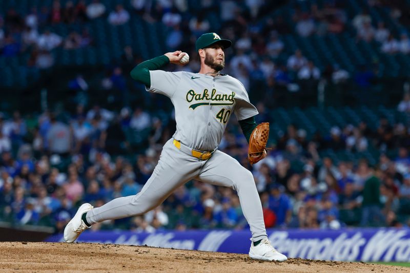 Sep 17, 2024; Chicago, Illinois, USA; Oakland Athletics starting pitcher Mitch Spence (40) delivers a pitch against the Chicago Cubs during the first inning at Wrigley Field. Mandatory Credit: Kamil Krzaczynski-Imagn Images