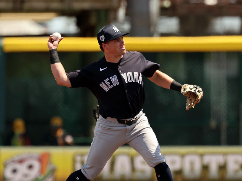 Mar 24, 2024; Bradenton, Florida, USA; New York Yankees infielder Caleb Durbin (87)  throws the ball for an out during the second inning against the Pittsburgh Pirates at LECOM Park. Mandatory Credit: Kim Klement Neitzel-USA TODAY Sports