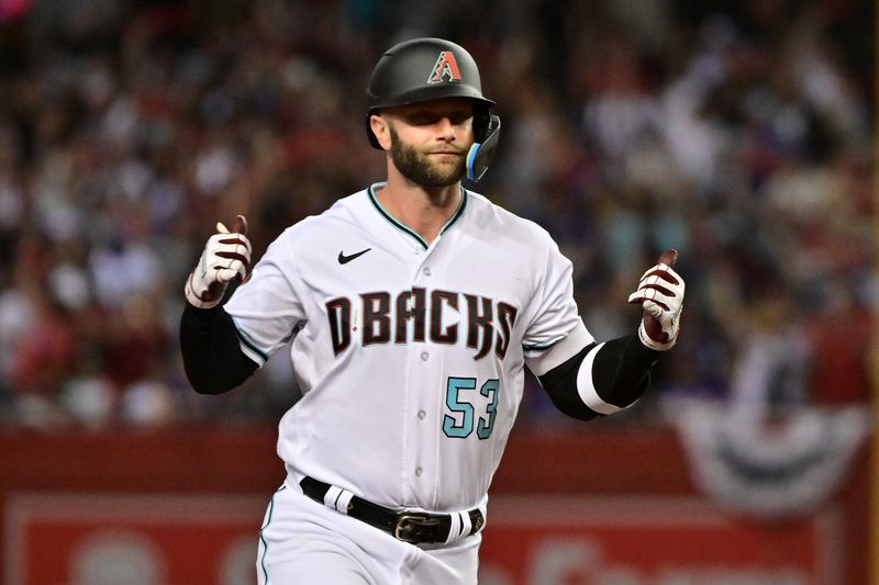 Oct 11, 2023; Phoenix, Arizona, USA; Arizona Diamondbacks first baseman Christian Walker (53) reacts after hitting a home run against the Los Angeles Dodgers in the third inning for game three of the NLDS for the 2023 MLB playoffs at Chase Field. Mandatory Credit: Matt Kartozian-USA TODAY Sports