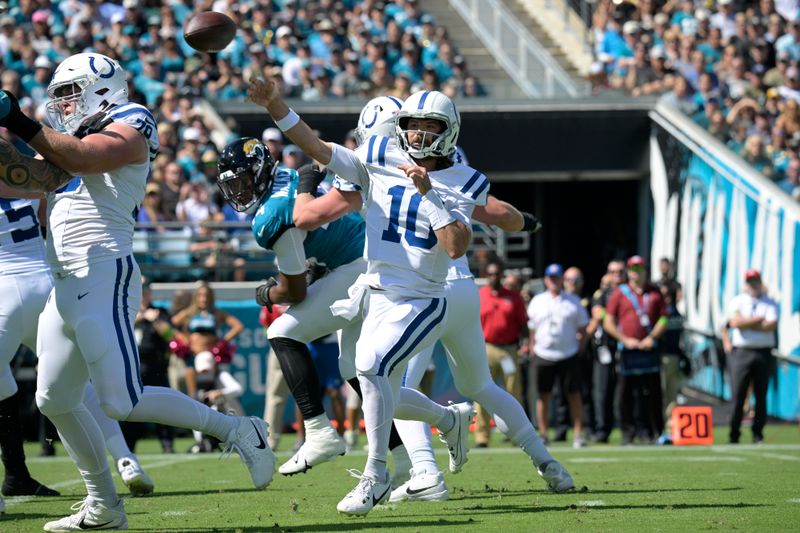 Indianapolis Colts quarterback Gardner Minshew (10) throws a pass during the first half of an NFL football game against the Jacksonville Jaguars, Sunday, Oct. 15, 2023, in Jacksonville, Fla. (AP Photo/Phelan M. Ebenhack)